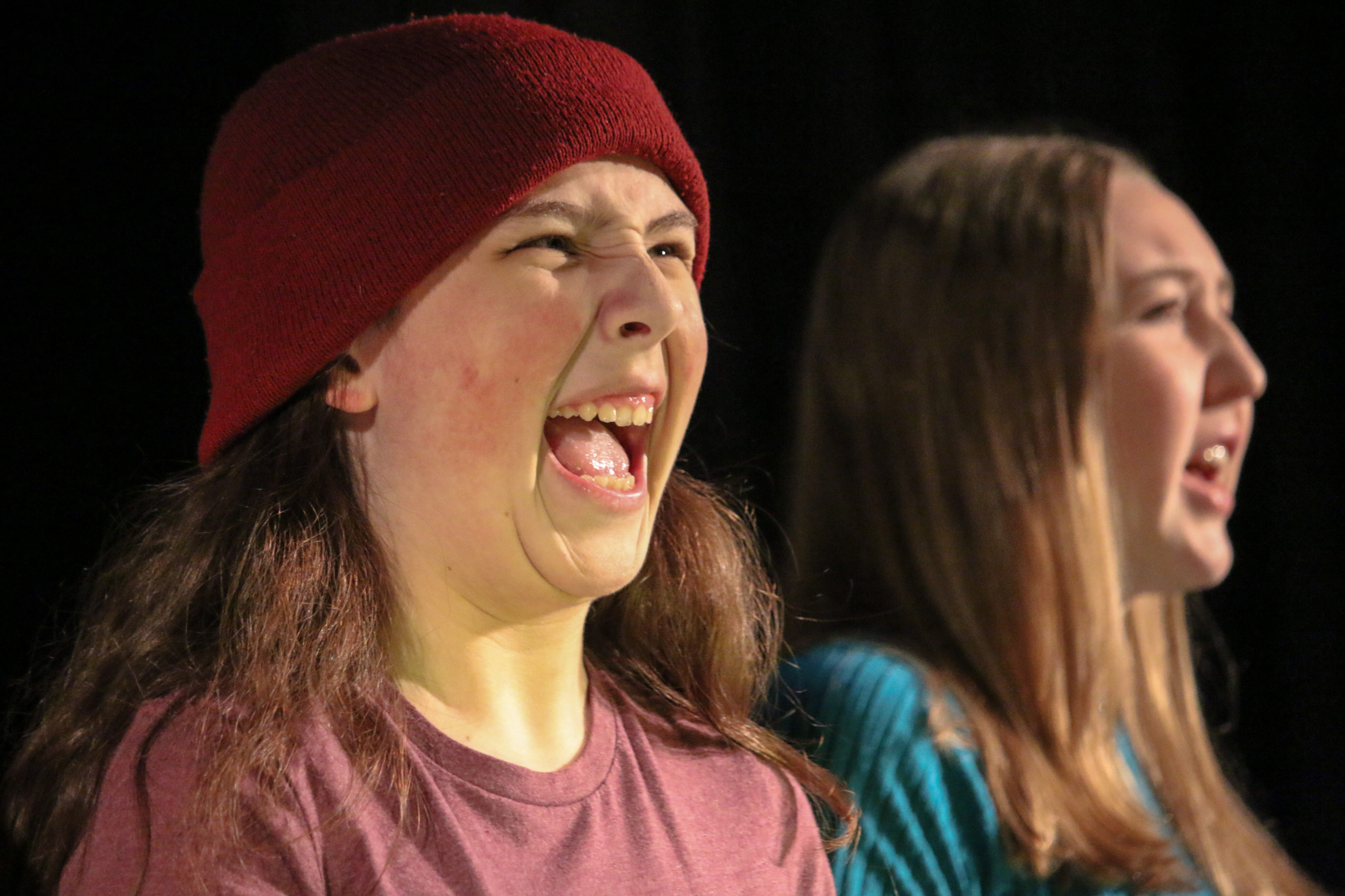 2-youth-with-mouths-open-speaking 2 youth with mouths open speaking